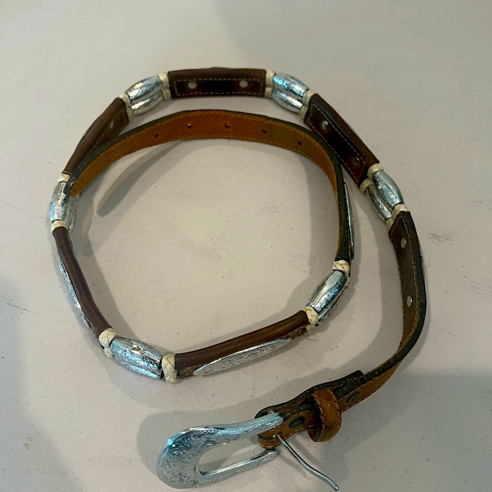 Leather belt with silver decor